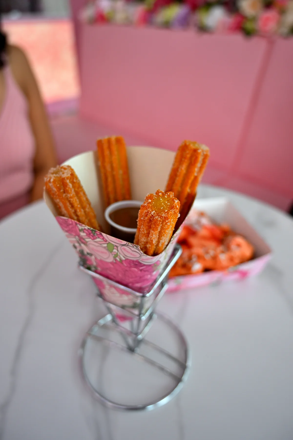 Golden churros with dipping sauce from The Sweet Spot in Virginia Beach