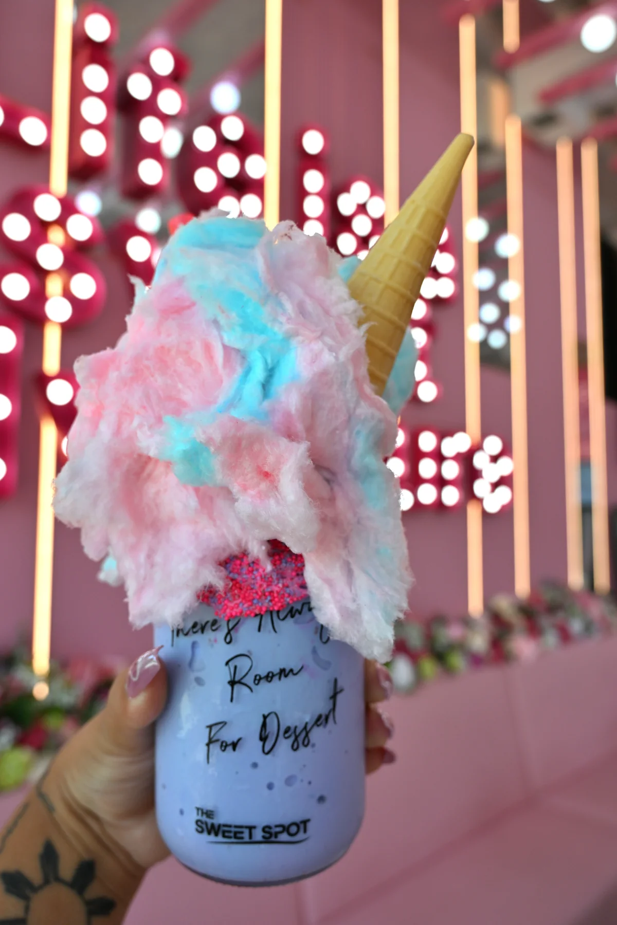 Cotton candy milkshake with an ice cream cone from The Sweet Spot in Virginia Beach