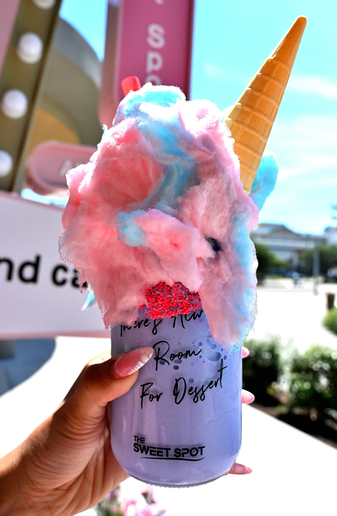 Cotton candy milkshake with an ice cream cone from The Sweet Spot in Virginia Beach
