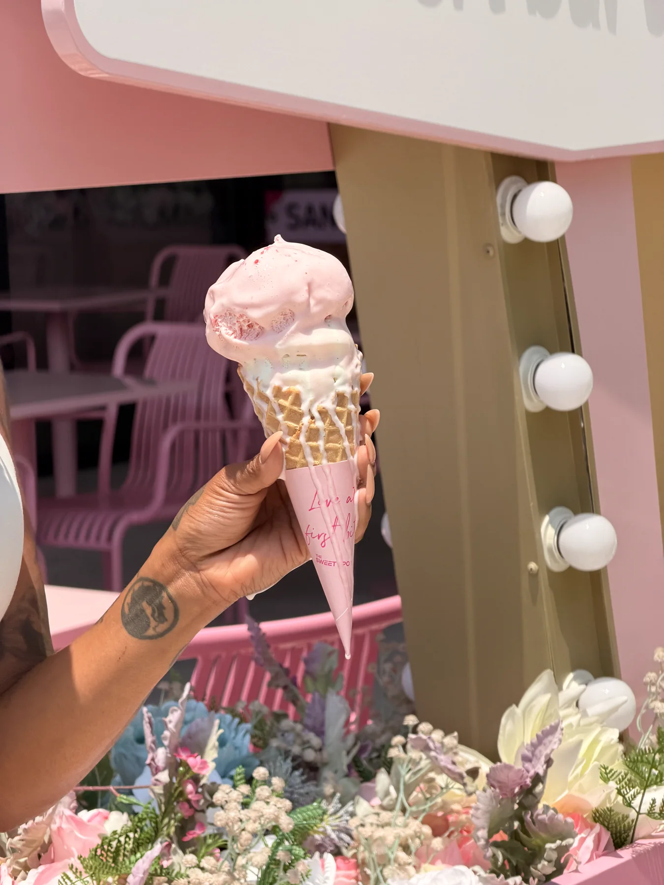 Premium ice cream in a waffle cone from The Sweet Spot in Virginia Beach