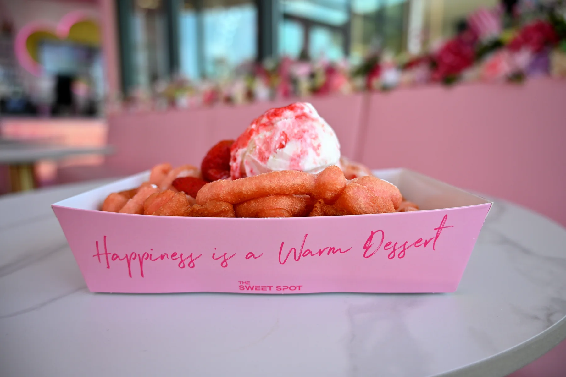 Warm strawberry dessert bites with premium ice cream from The Sweet Spot in Virginia Beach